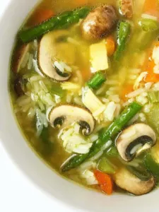 Warm and nourishing bowl of chicken, rice, and vegetable soup.