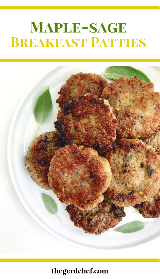 A white plate of breakfast sausage patties surrounded by fresh sage, with text overlay that says, "Maple-Sage Breakfast Patties. www.thegerdchef.com"