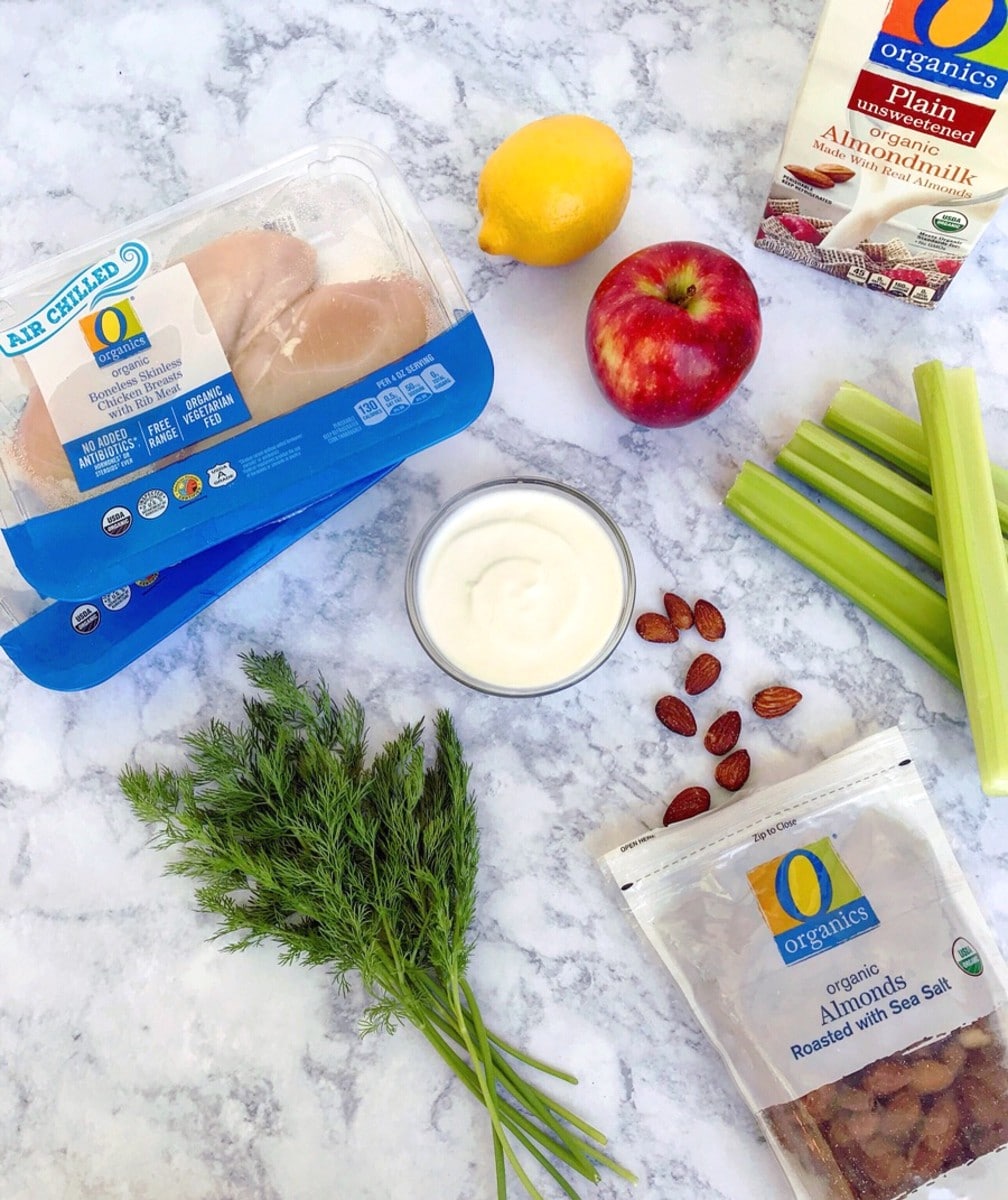 Ingredients for Fresh Dill Chicken Salad, including chicken breast, celery, apple, fresh dill, yogurt, almond milk, and almonds