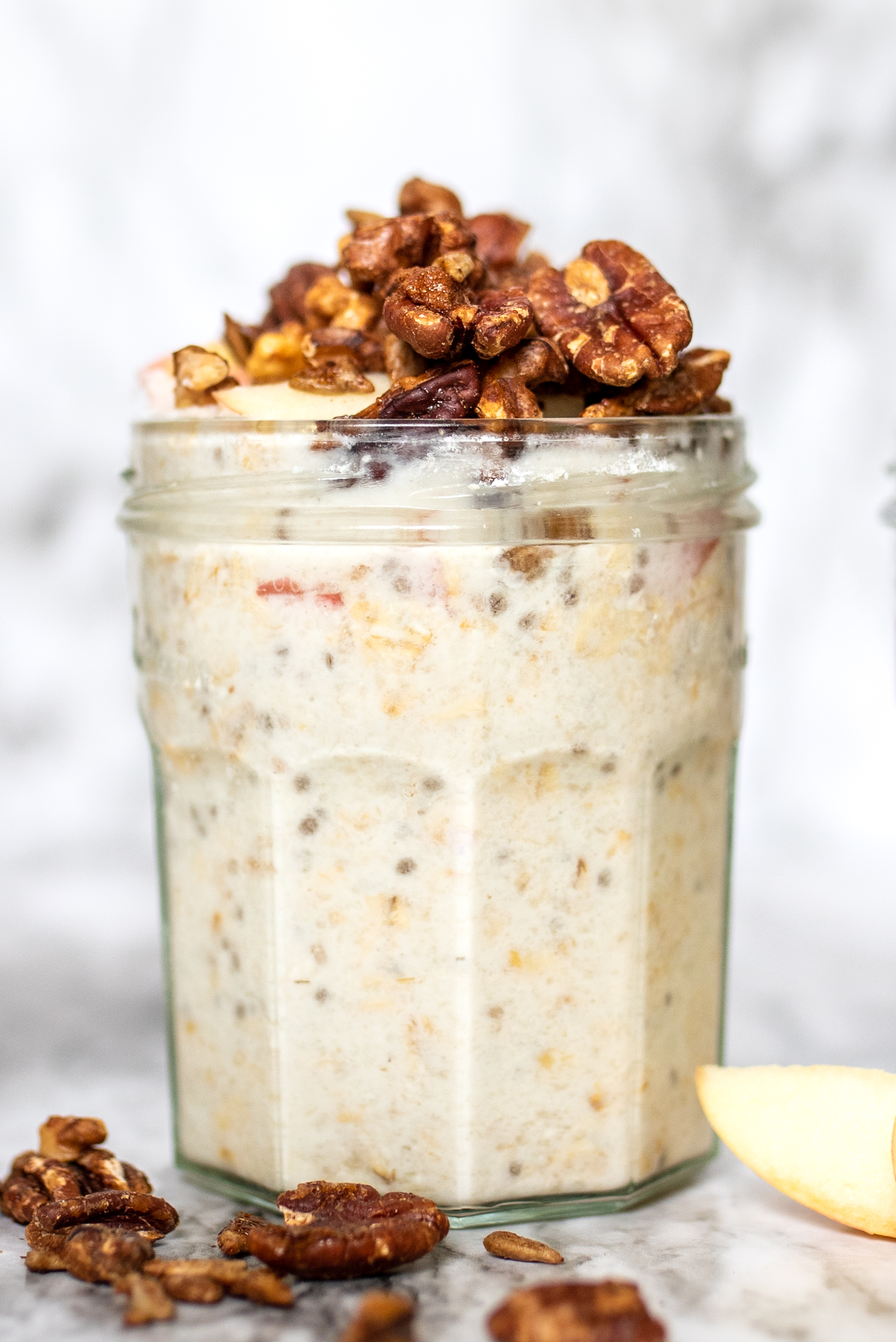 Jar of Apple Crumble Coconut Milk Overnight Oats with grain free granola 