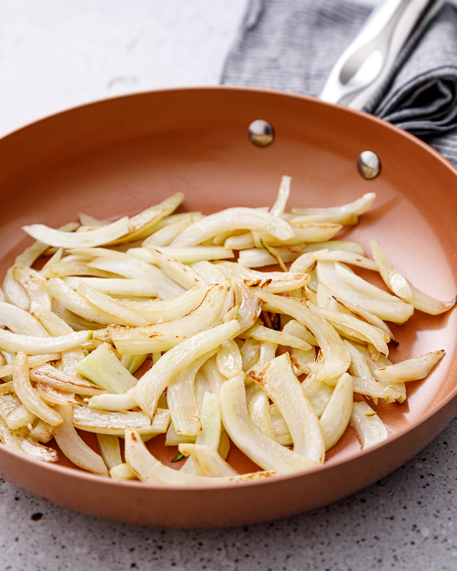 a skillet with cooked fennel