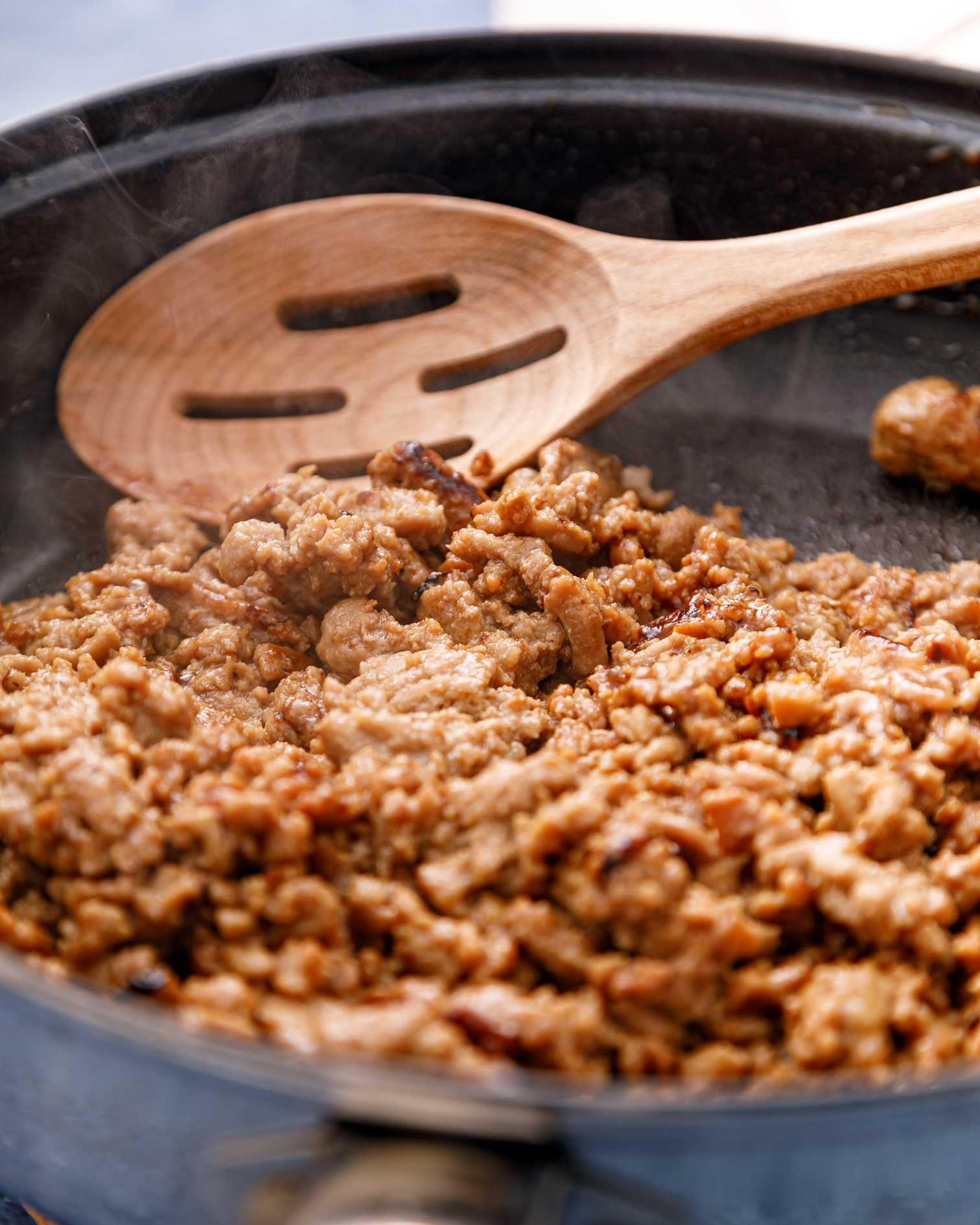 a skillet of cooked teriyaki turkey